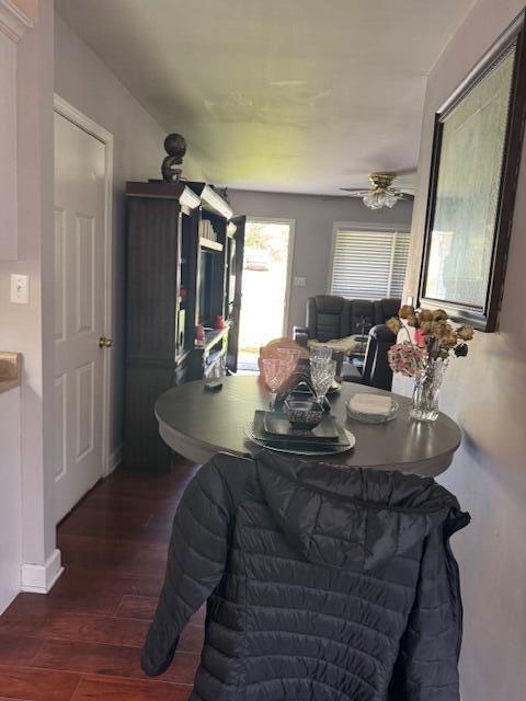 77 Bethy Rd, London, KY 40744 - dining room featuring wood finished floors, a ceiling fan, and baseboards