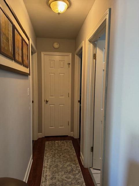 77 Bethy Rd, London, KY 40744 - corridor featuring dark wood-type flooring and baseboards
