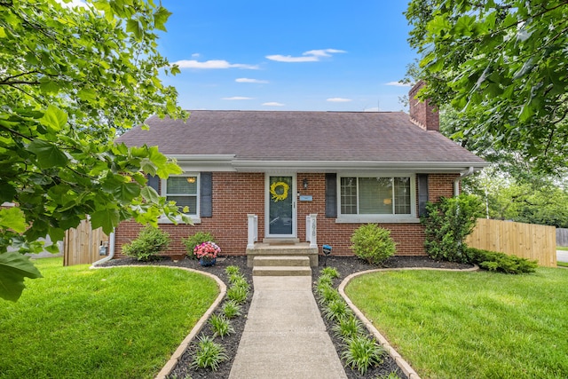 298 Hill N Dale Rd, Lexington, KY 40503 - view of front facade featuring brick siding, a shingled roof, and a chimney