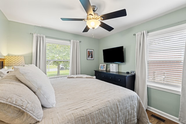 298 Hill N Dale Rd, Lexington, KY 40503 - bedroom with wood finished floors, baseboards, and ceiling fan