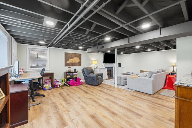 298 Hill N Dale Rd, Lexington, KY 40503 - living room featuring wood finished floors, a desk, and a fireplace