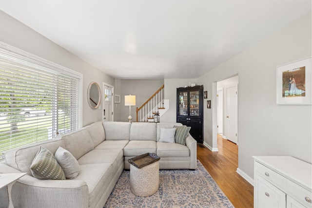 298 Hill N Dale Rd, Lexington, KY 40503 - living room with wood finished floors, stairway, and baseboards