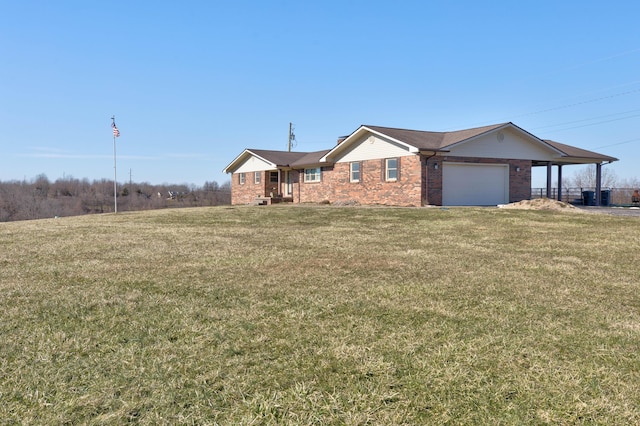 150 Stone Crest Rd, Winchester, KY 40391 - view of front of house featuring brick siding, a garage, and a front lawn