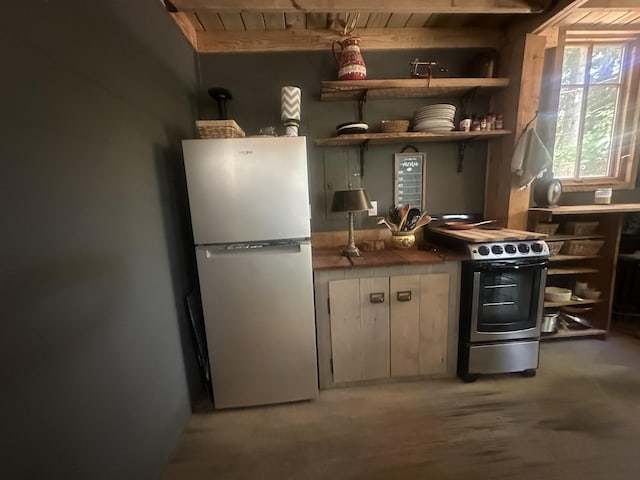 853 Rock Springs Rd, Celina, TN 38551 - kitchen featuring appliances with stainless steel finishes, tile countertops, wood ceiling, open shelves, and wood finished floors