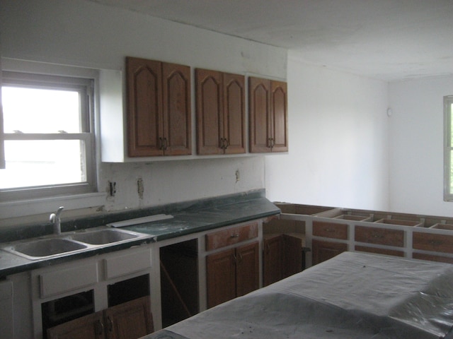 2960 Old Bloomfield Rd, Bloomfield, KY 40008 - kitchen with healthy amount of natural light, a sink, and dark countertops