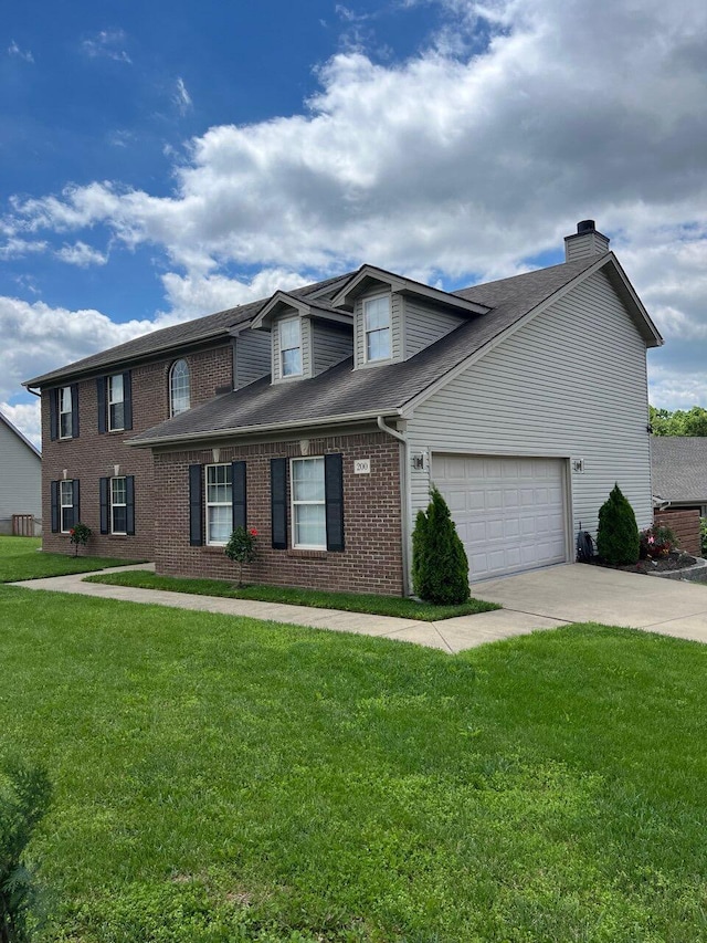 200 Manoah Ln, Nicholasville, KY 40356 - view of front of property featuring a chimney, driveway, a front yard, an attached garage, and a shingled roof