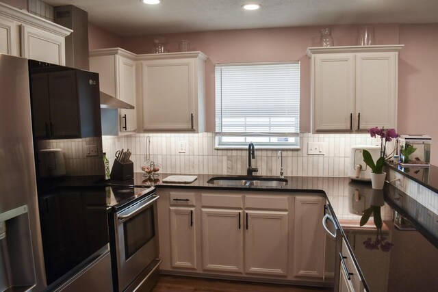 200 Manoah Ln, Nicholasville, KY 40356 - kitchen with a sink, backsplash, recessed lighting, and dark countertops