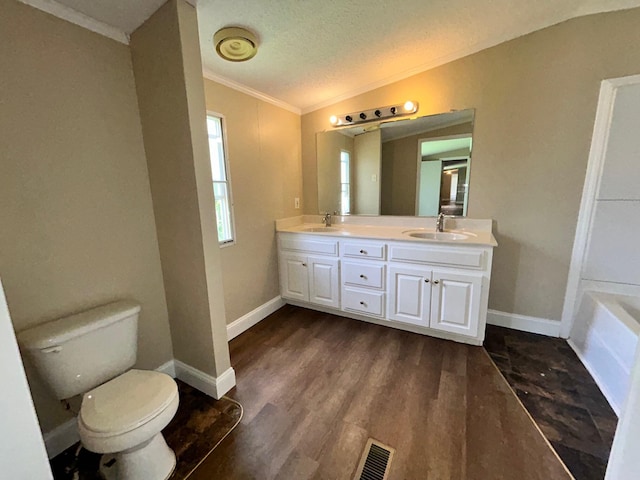 376 Cumberland Dr, Burnside, KY 42519 - bathroom with crown molding, toilet, double vanity, wood finished floors, and a bath