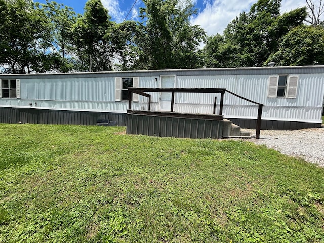 376 Cumberland Dr, Burnside, KY 42519 - rear view of house with a yard and a deck