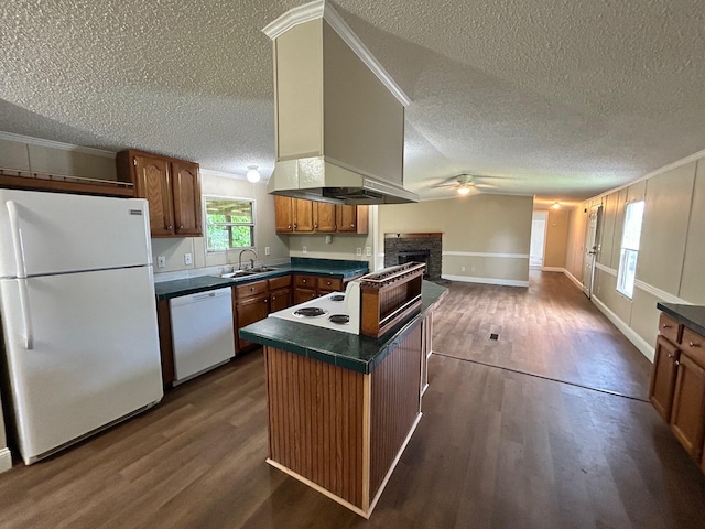 376 Cumberland Dr, Burnside, KY 42519 - kitchen featuring white appliances, a textured ceiling, open floor plan, a sink, and dark countertops