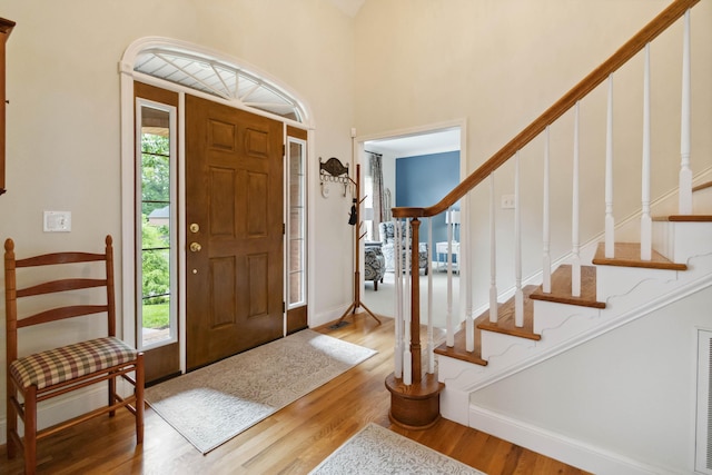 512 Water Cliff Dr, Somerset, KY 42503 - entryway featuring wood finished floors, stairs, baseboards, and a high ceiling