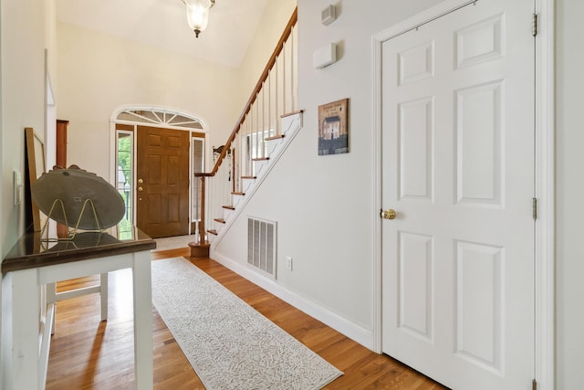 512 Water Cliff Dr, Somerset, KY 42503 - foyer entrance featuring stairs, wood finished floors, and baseboards