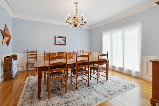 512 Water Cliff Dr, Somerset, KY 42503 - dining room featuring a chandelier, wood finished floors, a wainscoted wall, and crown molding