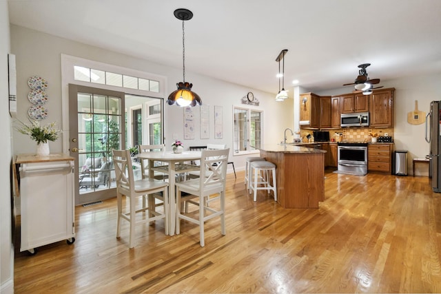 512 Water Cliff Dr, Somerset, KY 42503 - dining space featuring healthy amount of natural light, light wood-style flooring, and ceiling fan