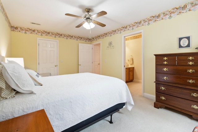 512 Water Cliff Dr, Somerset, KY 42503 - bedroom with light colored carpet, ensuite bath, baseboards, and ceiling fan