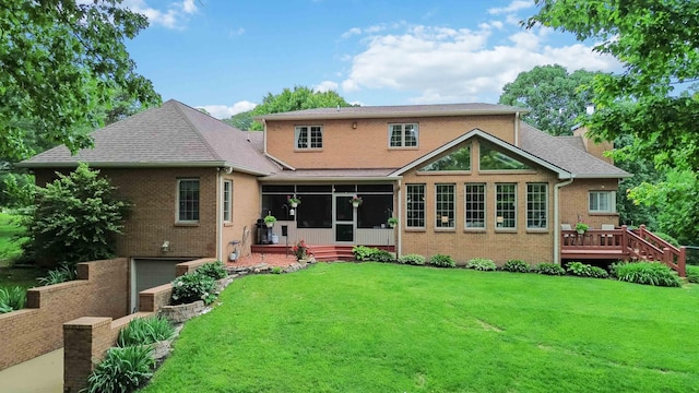 512 Water Cliff Dr, Somerset, KY 42503 - back of property featuring a sunroom, a garage, brick siding, a yard, and a wooden deck