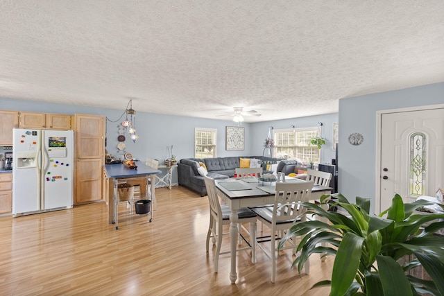 117 Autumn Dr, Russell Springs, KY 42642 - dining area with a textured ceiling, light wood-type flooring, and ceiling fan