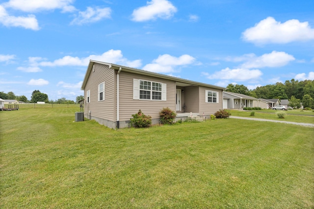117 Autumn Dr, Russell Springs, KY 42642 - view of front of house with a garage, a front lawn, crawl space, and central AC unit