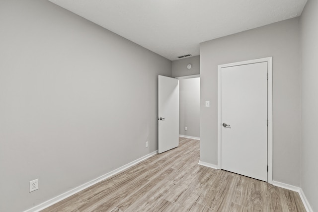 110 Hazel Ave, Lexington, KY 40502 - unfurnished bedroom featuring light wood-style flooring and baseboards