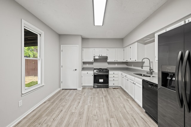 110 Hazel Ave, Lexington, KY 40502 - kitchen featuring refrigerator with ice dispenser, gas range, black dishwasher, a sink, and white cabinetry