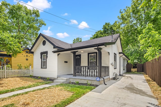 110 Hazel Ave, Lexington, KY 40502 - view of front of property featuring covered porch, concrete driveway, and a shingled roof