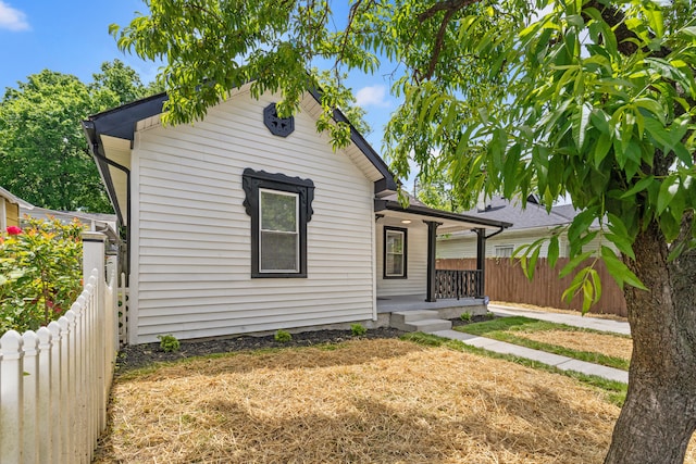 110 Hazel Ave, Lexington, KY 40502 - shotgun-style home with a porch