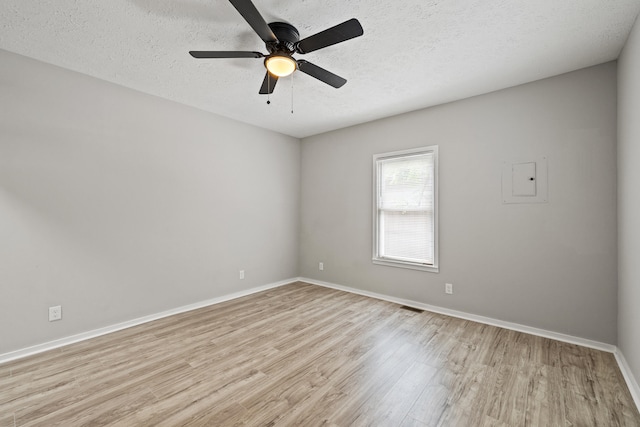 110 Hazel Ave, Lexington, KY 40502 - empty room with light wood-style floors, baseboards, a textured ceiling, and ceiling fan