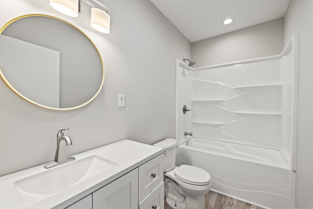 110 Hazel Ave, Lexington, KY 40502 - full bath with wood finished floors, vanity, toilet, shower / bathtub combination, and recessed lighting