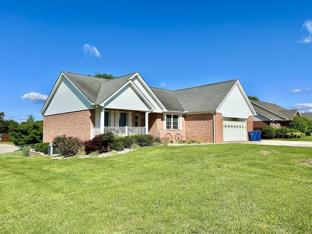 317 Hidden Loop Dr, Somerset, KY 42503 - ranch-style home featuring an attached garage, covered porch, a front lawn, concrete driveway, and brick siding