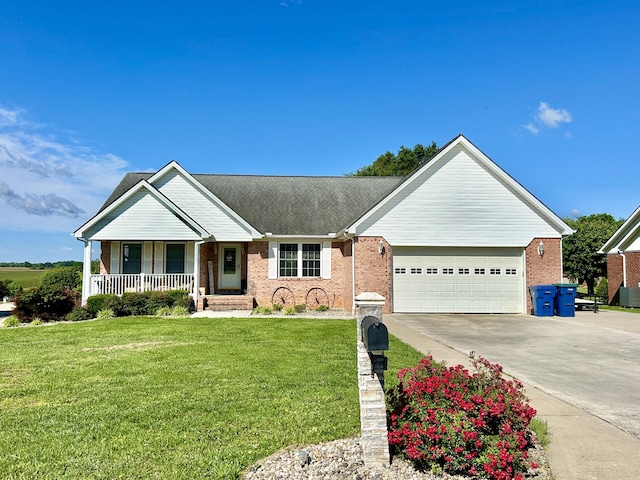 317 Hidden Loop Dr, Somerset, KY 42503 - ranch-style house with brick siding, concrete driveway, a garage, covered porch, and a front lawn