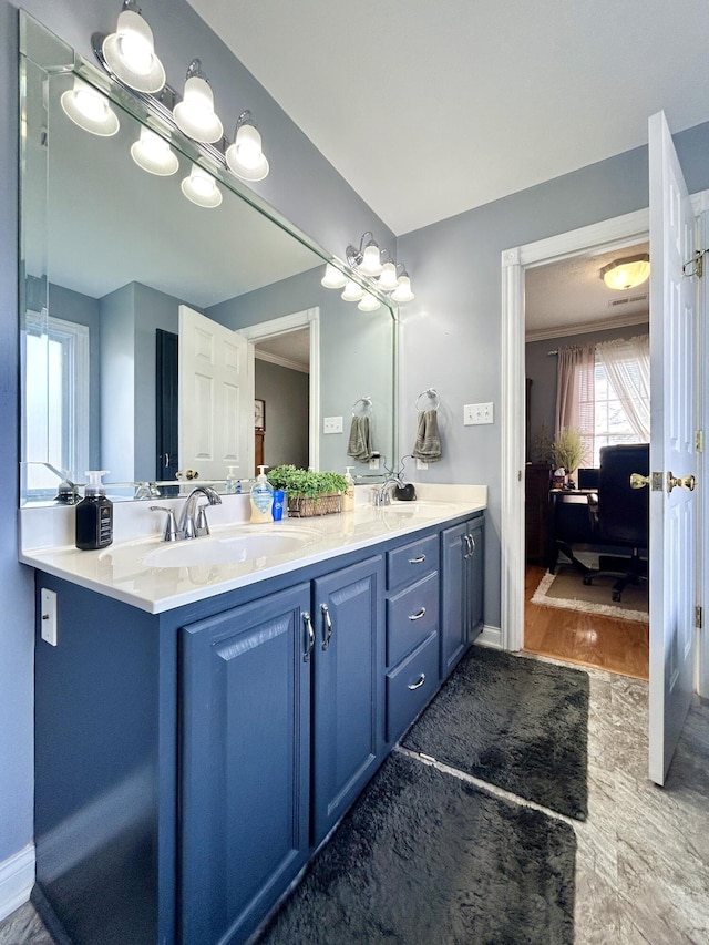 317 Hidden Loop Dr, Somerset, KY 42503 - ensuite bathroom with double vanity and baseboards