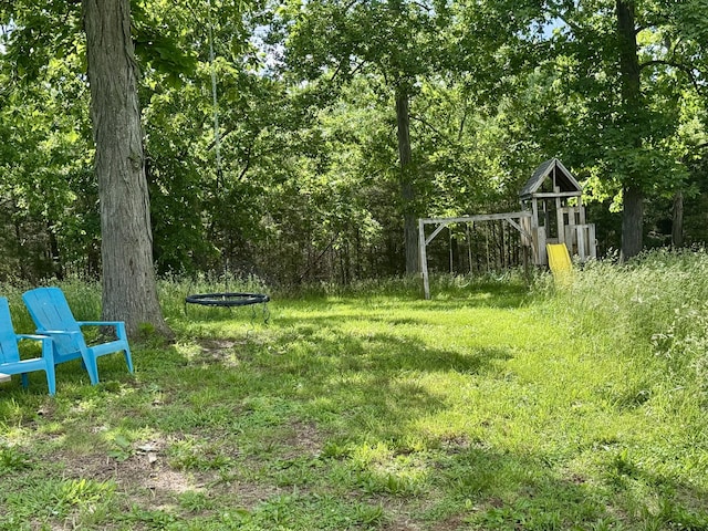 42 Cambron Ln, Raywick, KY 40060 - view of yard with a forest view and a playground