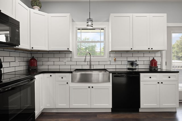 42 Cambron Ln, Raywick, KY 40060 - kitchen featuring black appliances, dark countertops, white cabinetry, dark wood-type flooring, and backsplash
