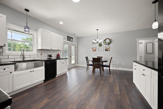 42 Cambron Ln, Raywick, KY 40060 - kitchen with dishwasher, dark countertops, dark wood-type flooring, decorative backsplash, and recessed lighting