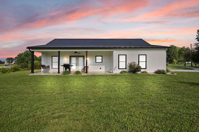 42 Cambron Ln, Raywick, KY 40060 - back of house featuring a ceiling fan, a lawn, a metal roof, and french doors