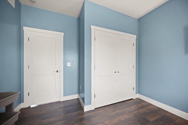 42 Cambron Ln, Raywick, KY 40060 - unfurnished bedroom with dark wood-style flooring and a closet