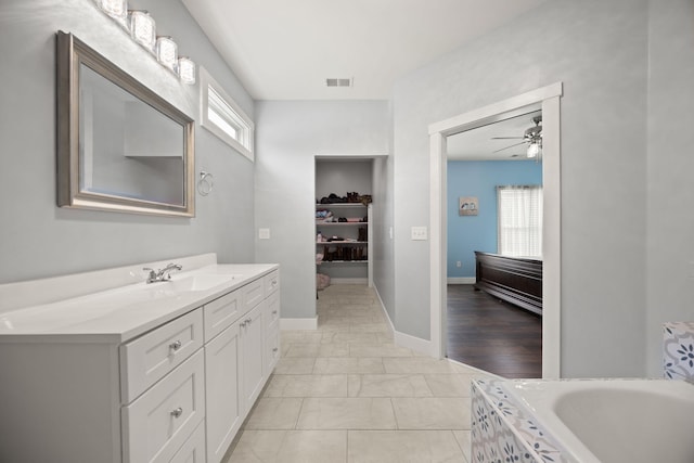 42 Cambron Ln, Raywick, KY 40060 - full bath featuring vanity, healthy amount of natural light, a bathtub, and a ceiling fan