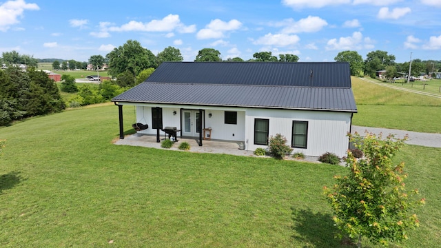 42 Cambron Ln, Raywick, KY 40060 - view of front of house with a front lawn, a metal roof, french doors, and a patio area