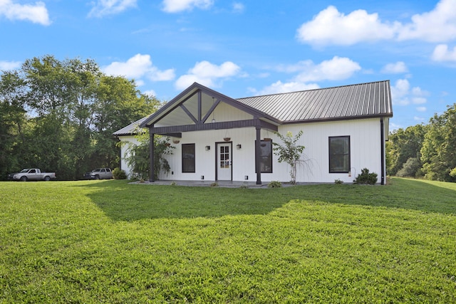 42 Cambron Ln, Raywick, KY 40060 - modern inspired farmhouse with a front lawn, a metal roof, and a porch