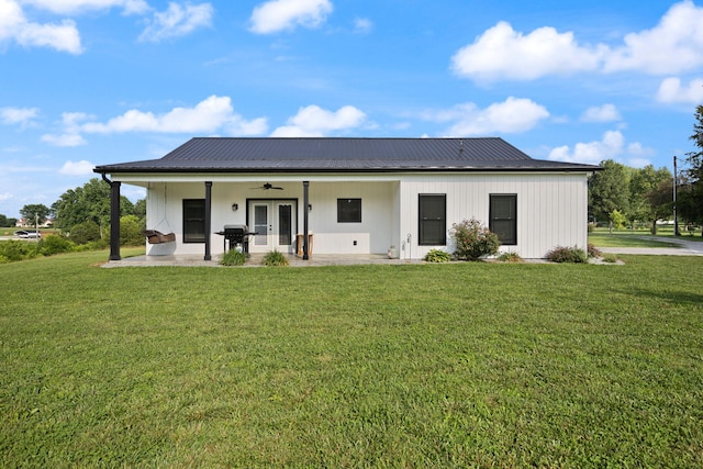 42 Cambron Ln, Raywick, KY 40060 - rear view of property featuring french doors, ceiling fan, a yard, a metal roof, and a patio area