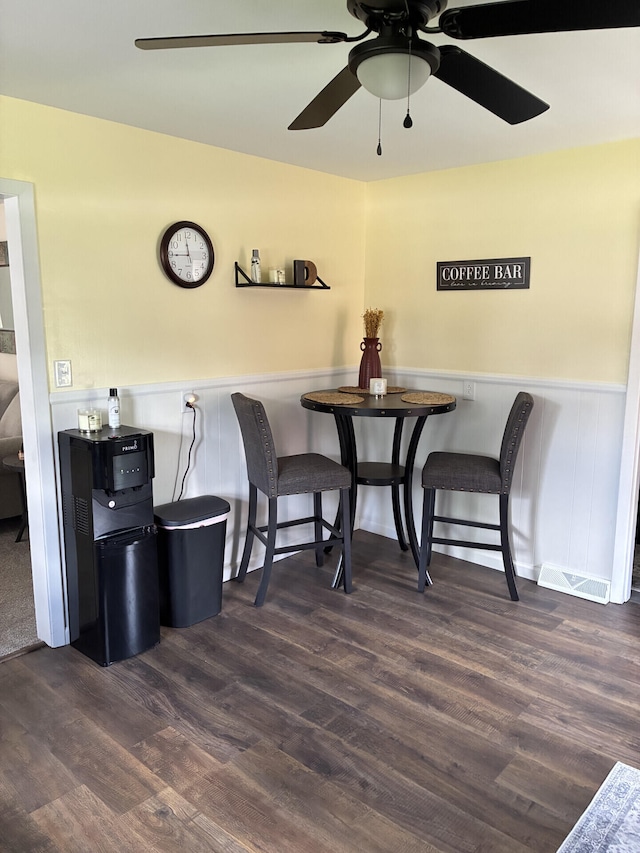 212 Baughman Ave, Danville, KY 40422 - dining room with ceiling fan, a wainscoted wall, and wood finished floors