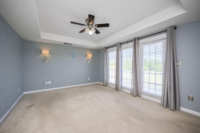 113 Medinah Ct, Frankfort, KY 40601 - carpeted spare room featuring a raised ceiling, baseboards, and ceiling fan
