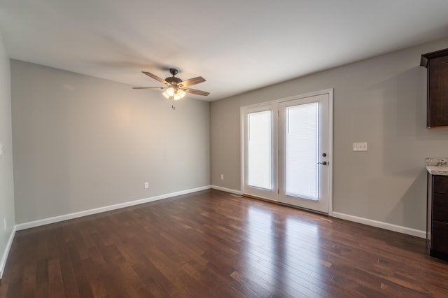 2296 Boonesborough Rd, Richmond, KY 40475 - unfurnished room with a ceiling fan, dark wood finished floors, and baseboards