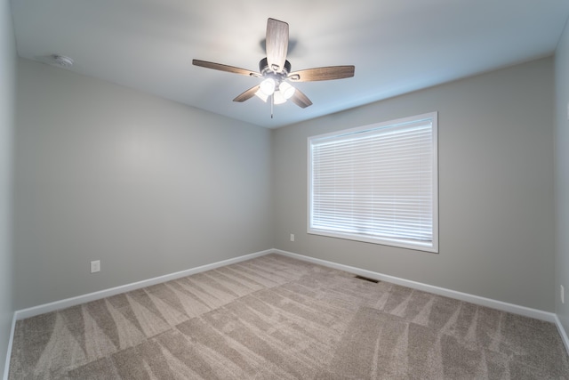 2296 Boonesborough Rd, Richmond, KY 40475 - carpeted spare room featuring baseboards and a ceiling fan