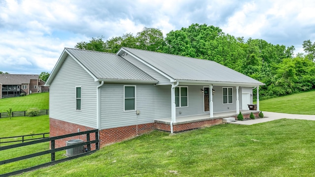 2296 Boonesborough Rd, Richmond, KY 40475 - view of front of property with a porch, metal roof, and central AC unit