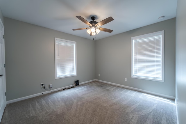 2296 Boonesborough Rd, Richmond, KY 40475 - carpeted spare room featuring ceiling fan, baseboards, healthy amount of natural light, and a smoke detector