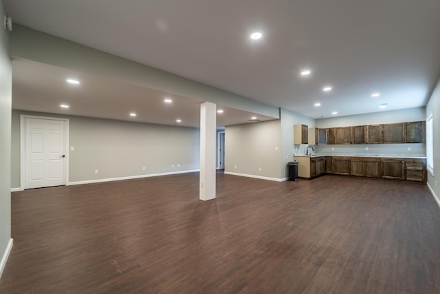 2296 Boonesborough Rd, Richmond, KY 40475 - kitchen with light countertops, dark wood-type flooring, open floor plan, recessed lighting, and a sink
