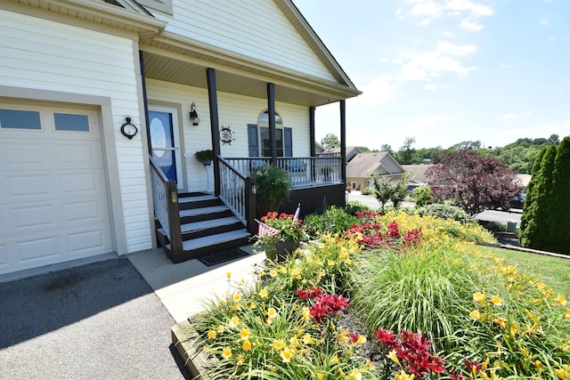 360 Persimmon Way, Harrodsburg, KY 40330 - doorway to property featuring covered porch and an attached garage