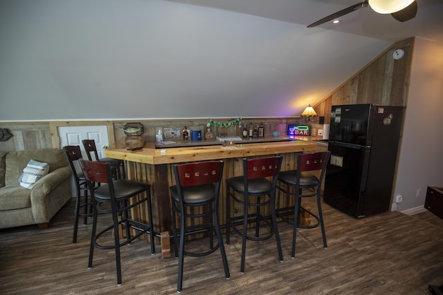 360 Persimmon Way, Harrodsburg, KY 40330 - kitchen with freestanding refrigerator, wood counters, vaulted ceiling, dark wood-style flooring, and wooden walls