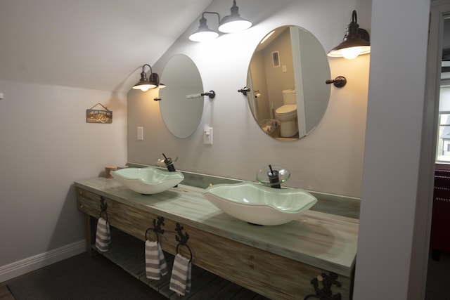 360 Persimmon Way, Harrodsburg, KY 40330 - bathroom featuring double vanity, toilet, and baseboards